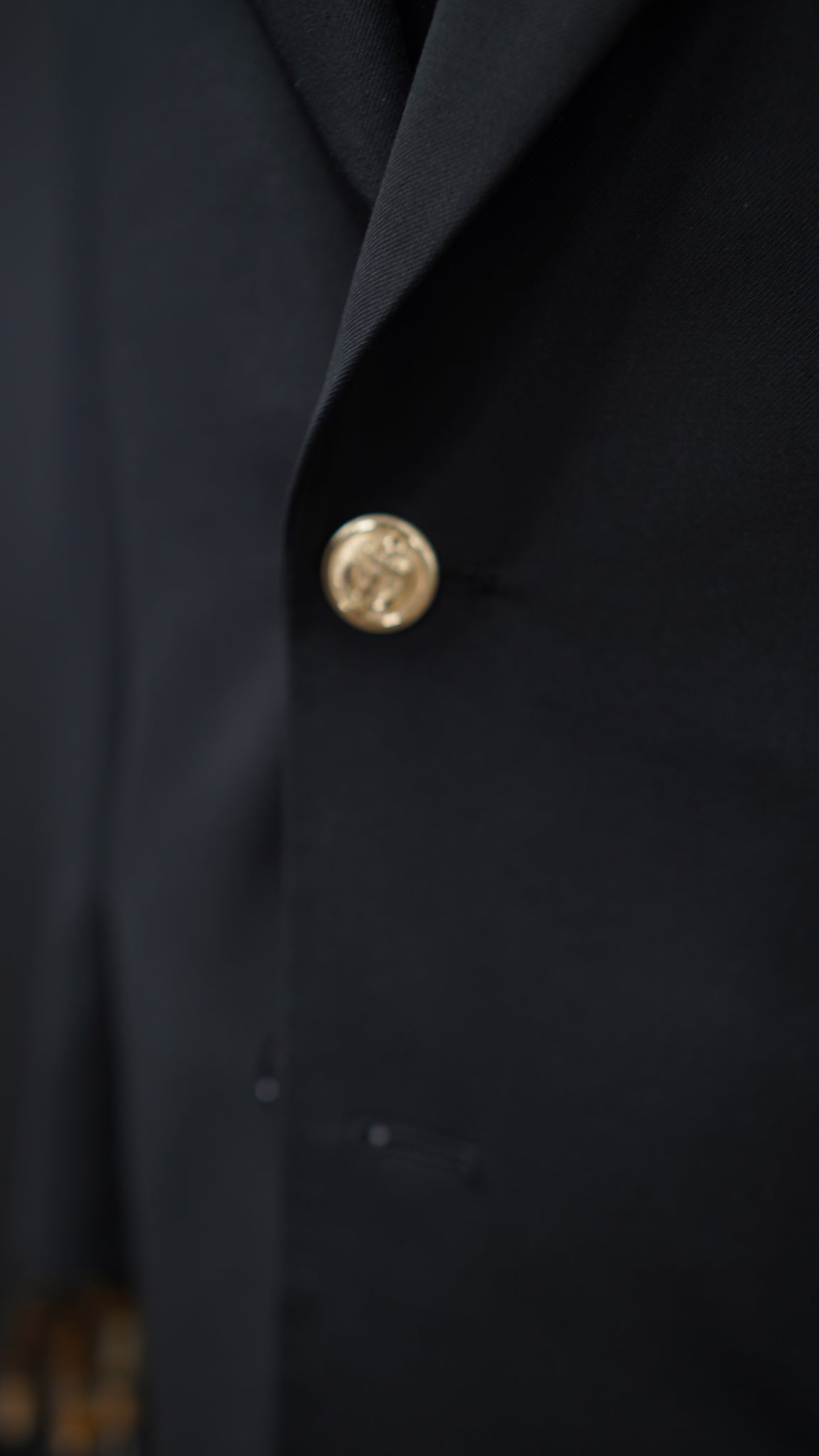 Black Peak lapel suit with Green & Red Armband