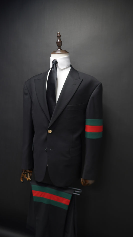 Black Peak lapel suit with Green & Red Armband