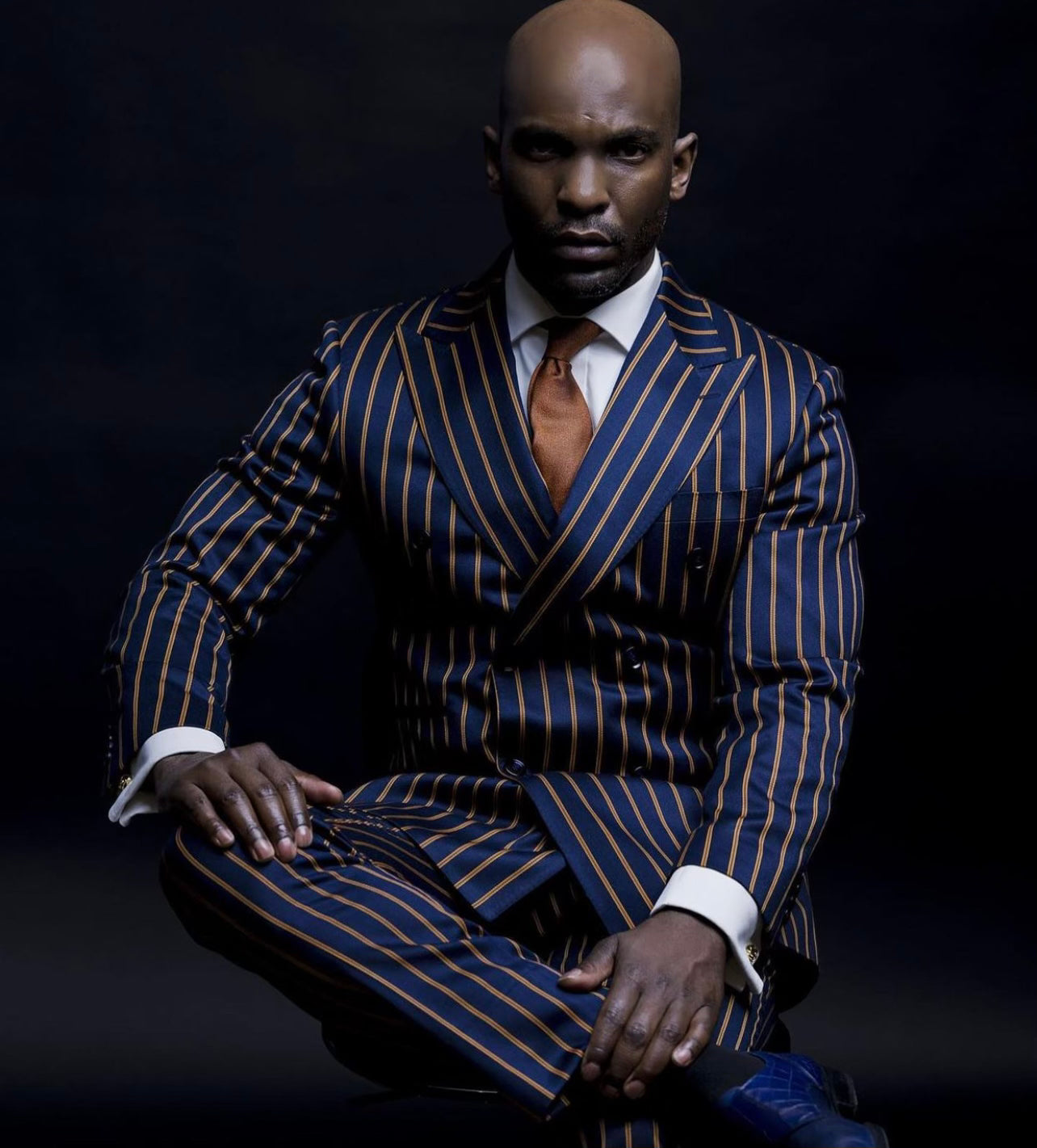 Navy pinstripe top double breasted suit